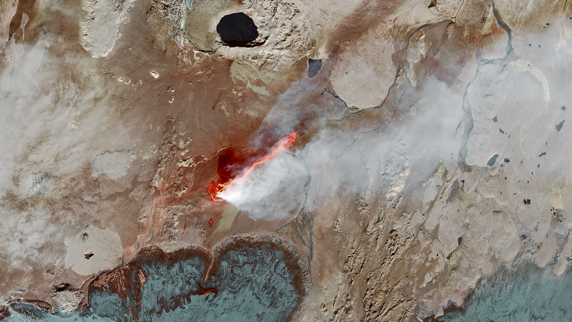 Eruptionsspalte Holuhraun; copyright: NASA Earth Observatory, free licence.